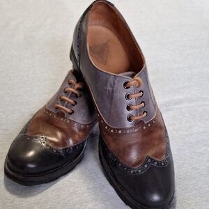Black, Gray, and Brown Leather Oxford Shoes with Wingtip Design
